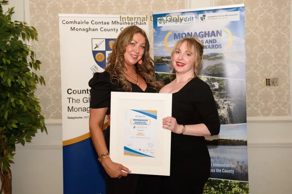 Grace and Sarah receiving a Monaghan county business award